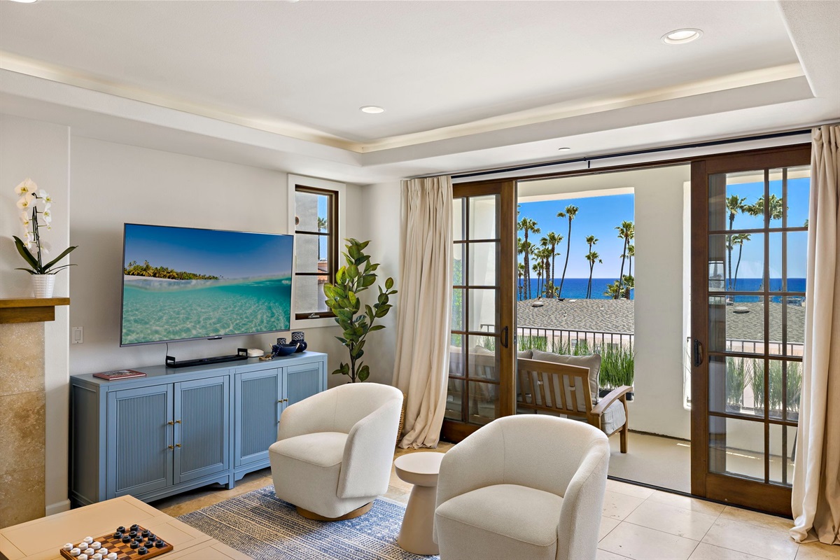 The best of both worlds - this condo is steps from the San Clemente main beach and short walk (or trolley ride) to the village.  The living room has lots of comfortable seating, views and natural light pouring in from the balcony.