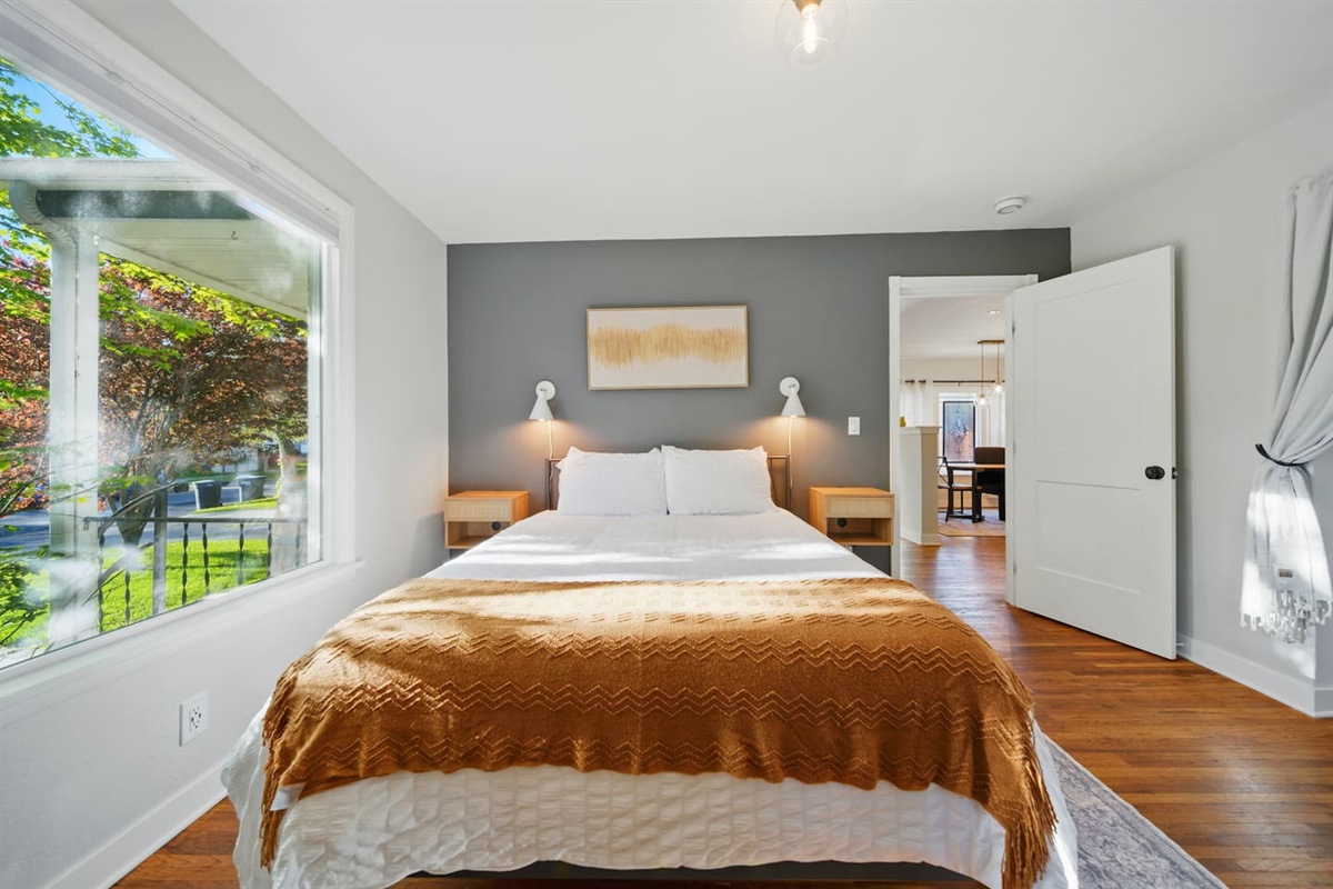 Queen bedroom #1, view to the shaded front yard.