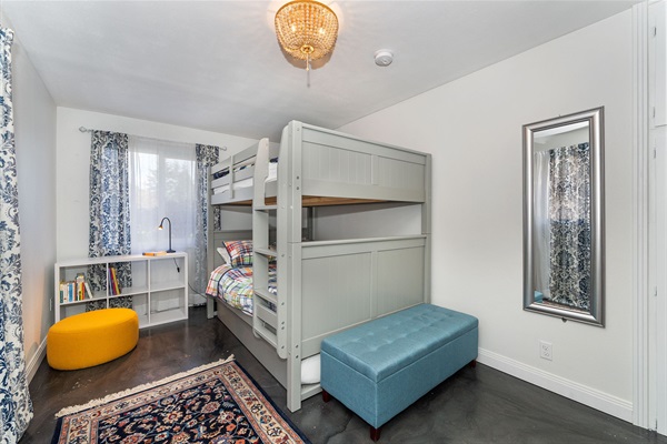 The second bedroom has a full-over-full bunk with a twin-size trundle