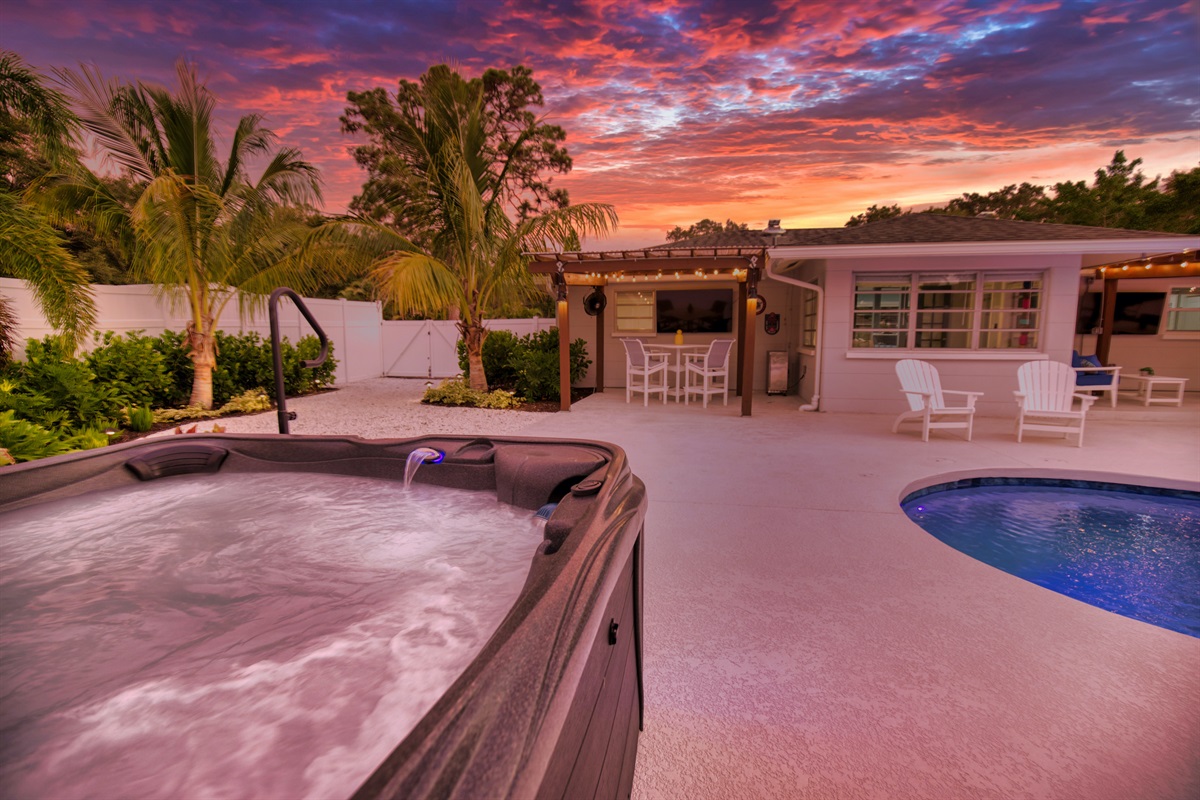 Catch the game on the 75" TV from the HOT TUB!