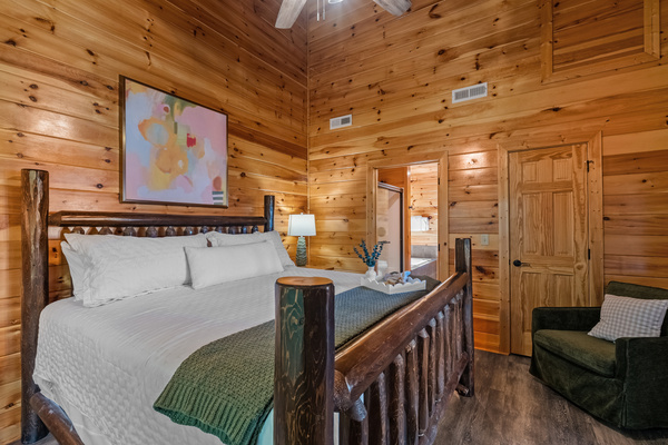 Upstairs king bedroom with cozy sitting area