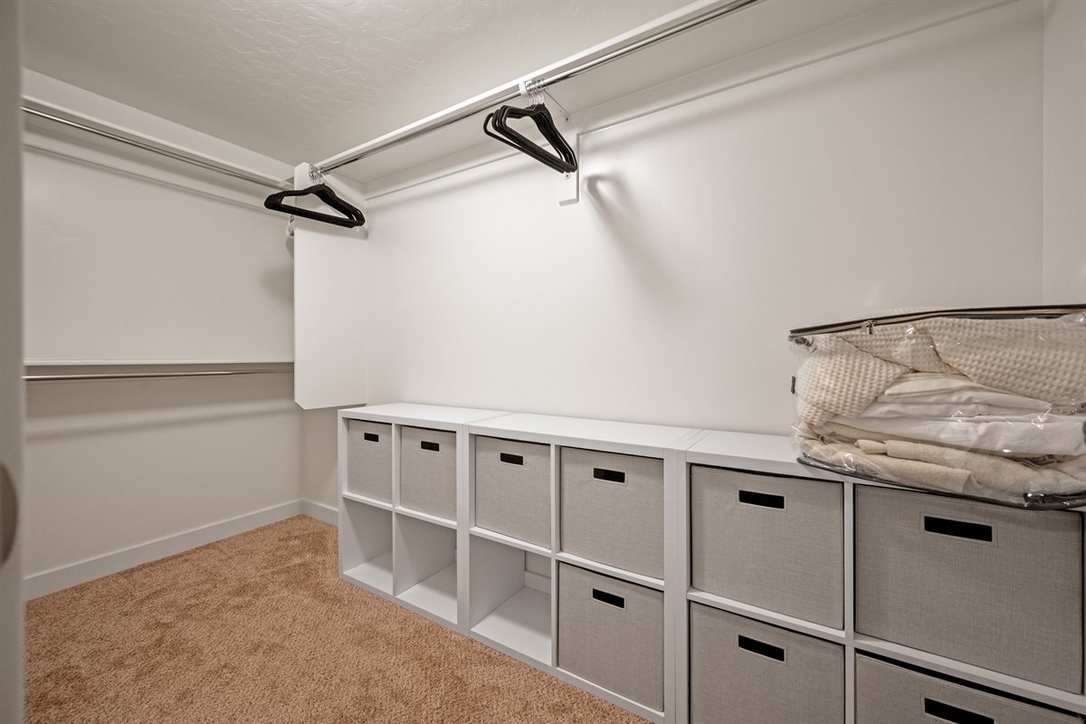 Enjoy the convenience of a roomy walk-in closet with abundant storage and hanging space to keep everything in order.