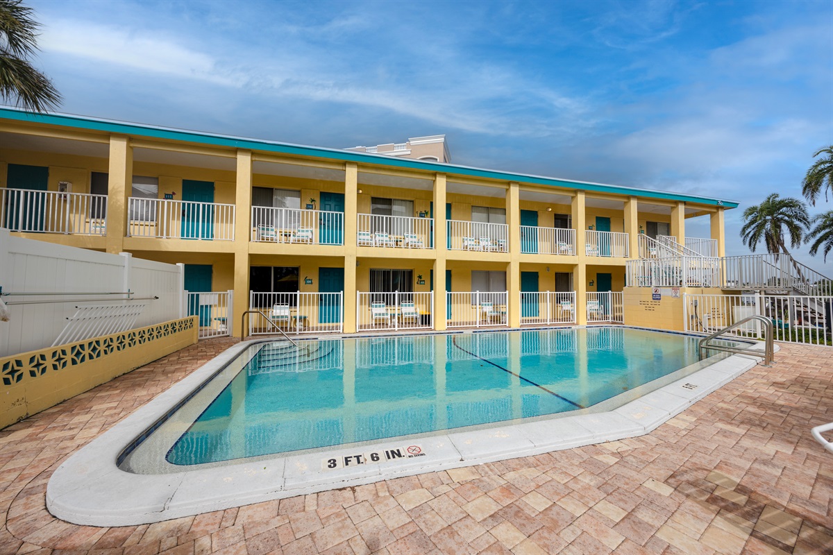 large pool area with loungers