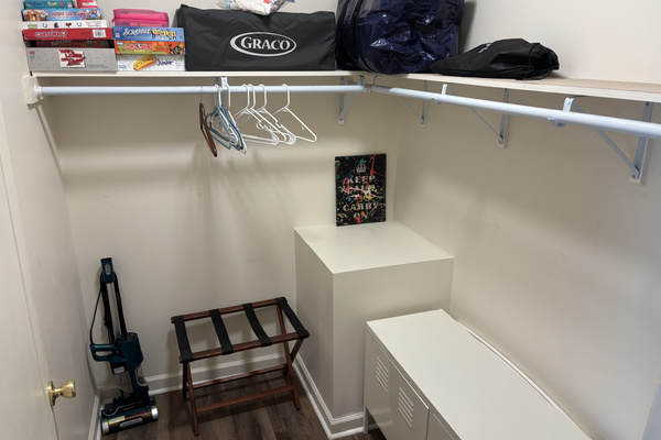 Walk-in closet in the primary suite with ample clothing and luggage storage for extended stays.