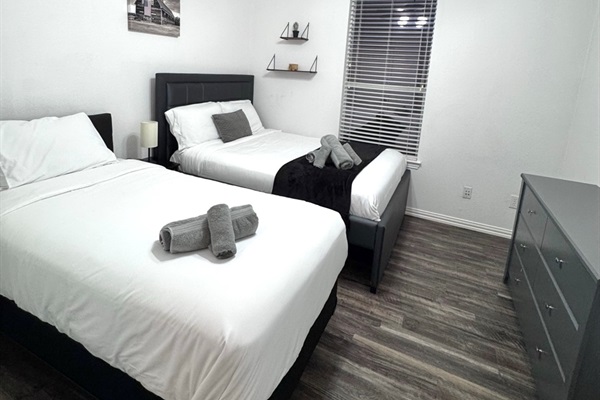 Designed with families in mind, this room offers a full-size bed and a twin bed.