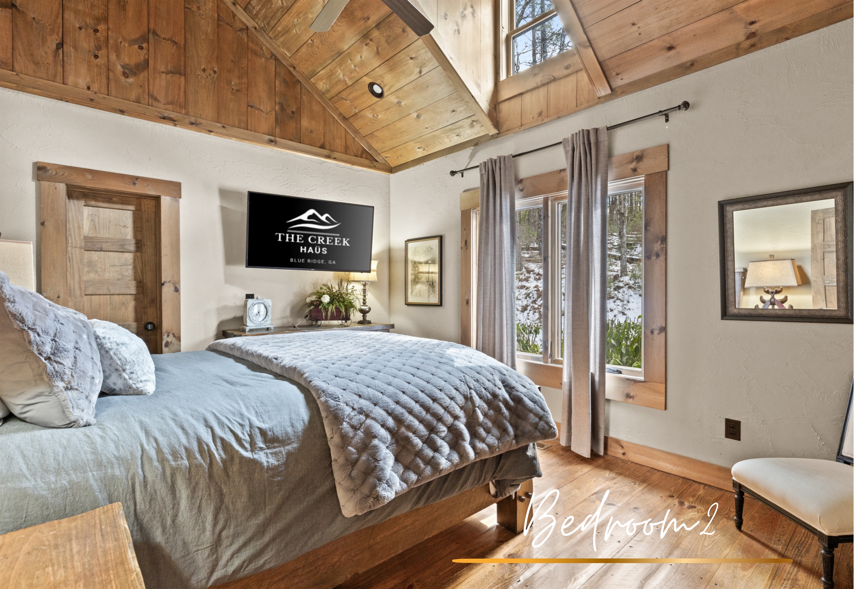 Bedroom 2: This inviting queen bedroom offers soft linens, natural light, and tranquil views, making it the perfect spot to recharge after a day of adventure