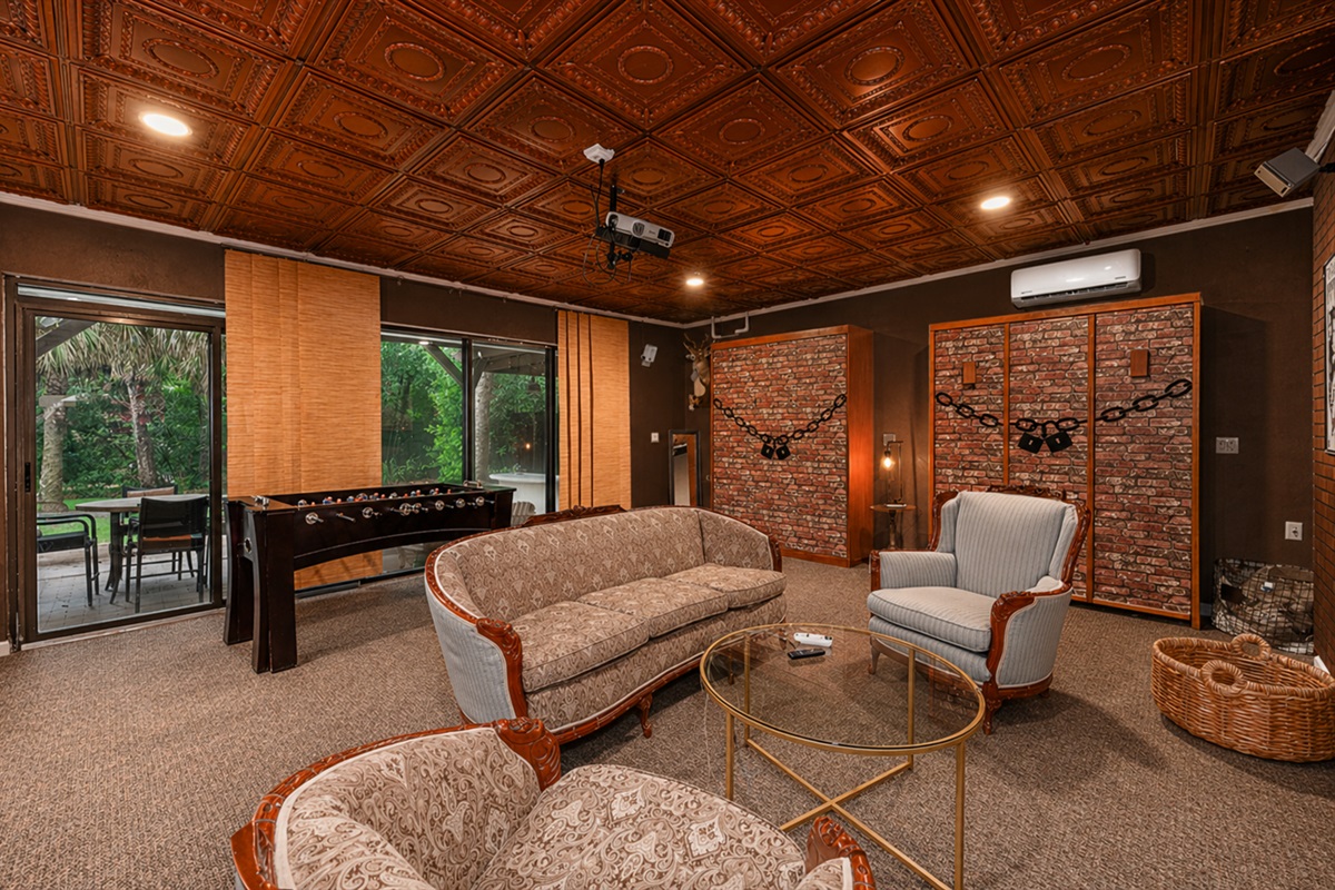The Speakeasy features two queen Murphy beds and two queen blow-up beds for flexible sleeping space.
