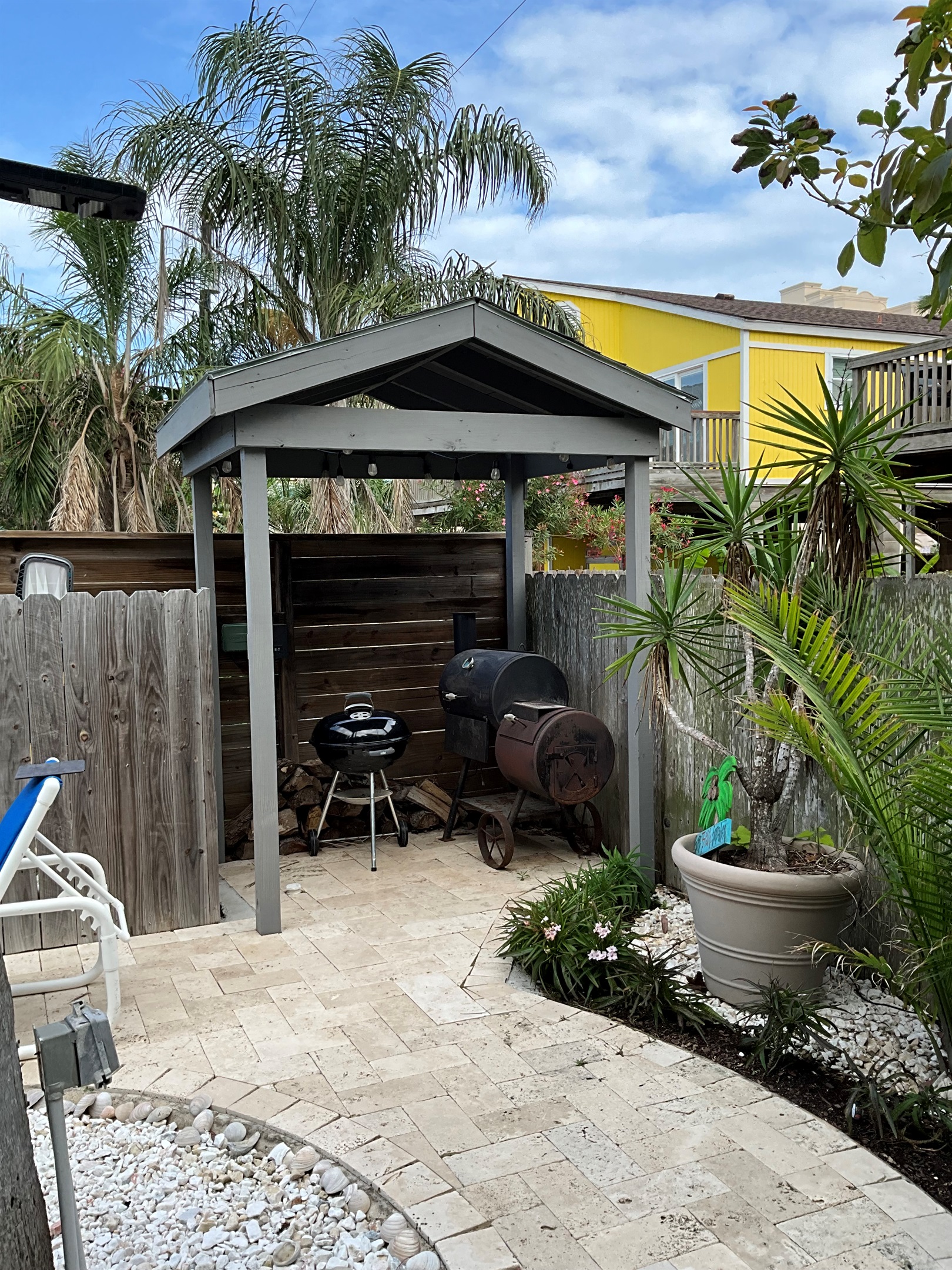 Covered grilling and smoker area