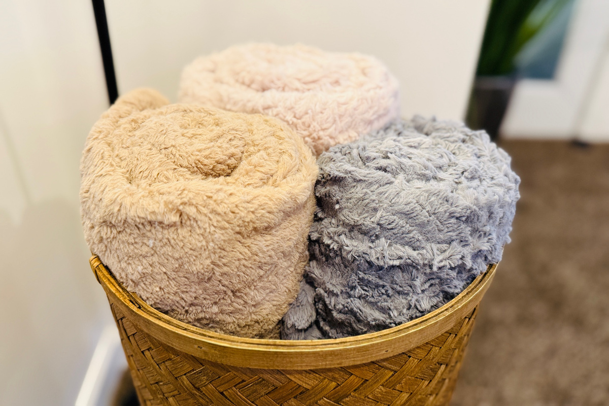 Plush throw blankets are available for cozy evenings in.