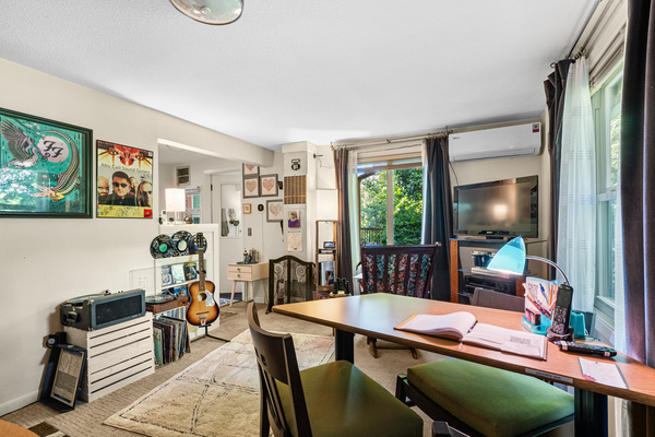 Records, guitars, and good light — a room with a soul.