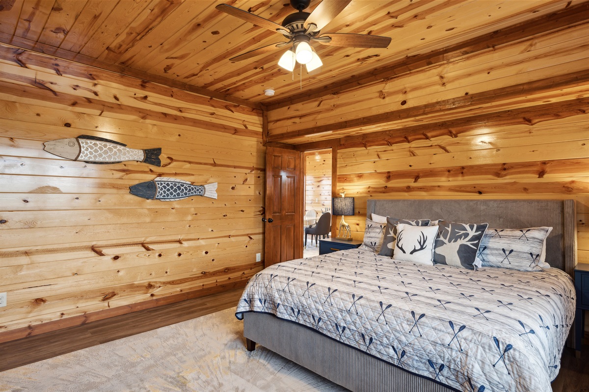 King bedroom with TV and full ensuite bathroom.