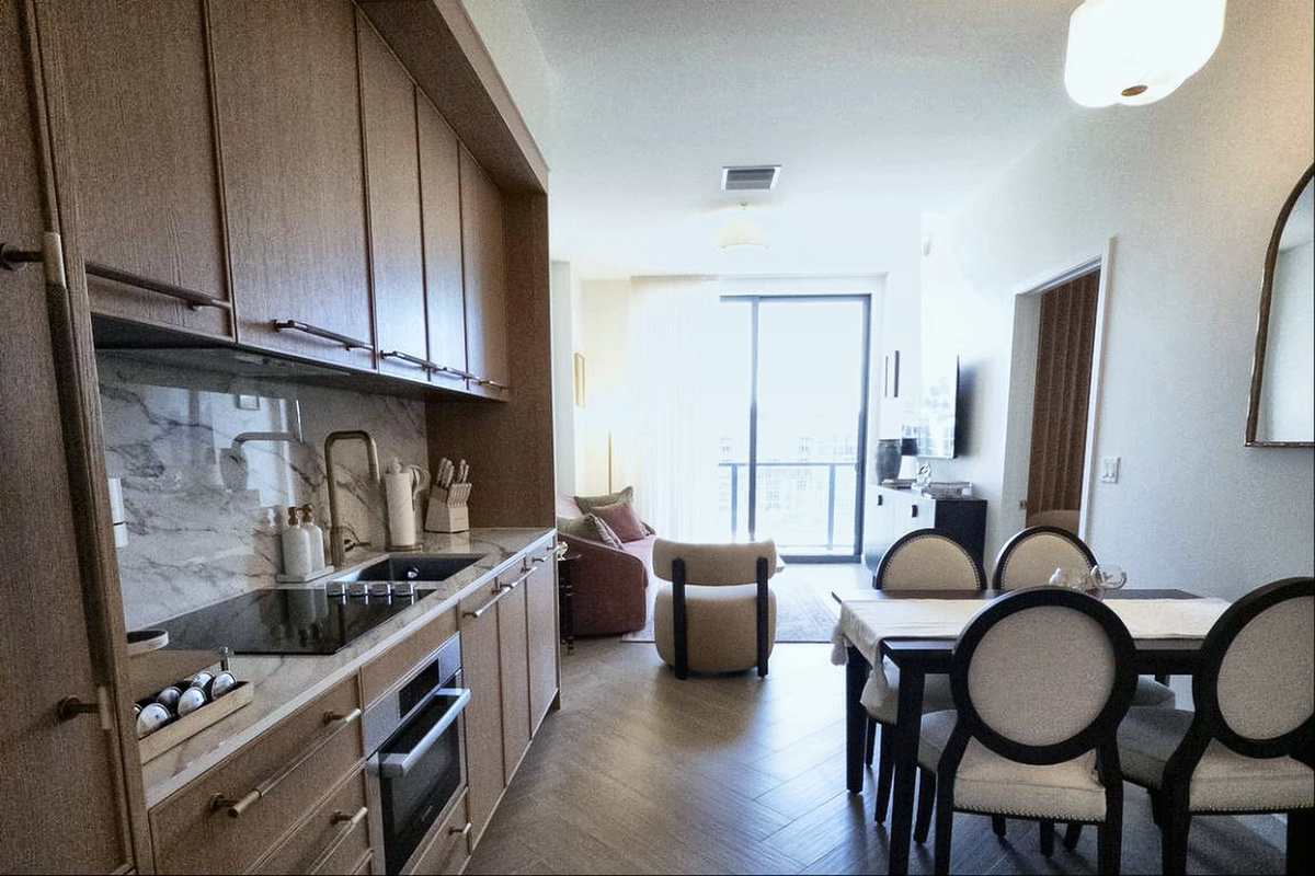 The living room opens to your private balcony with 8th-floor views over Wynwood - and the king suite is just a doorway away.