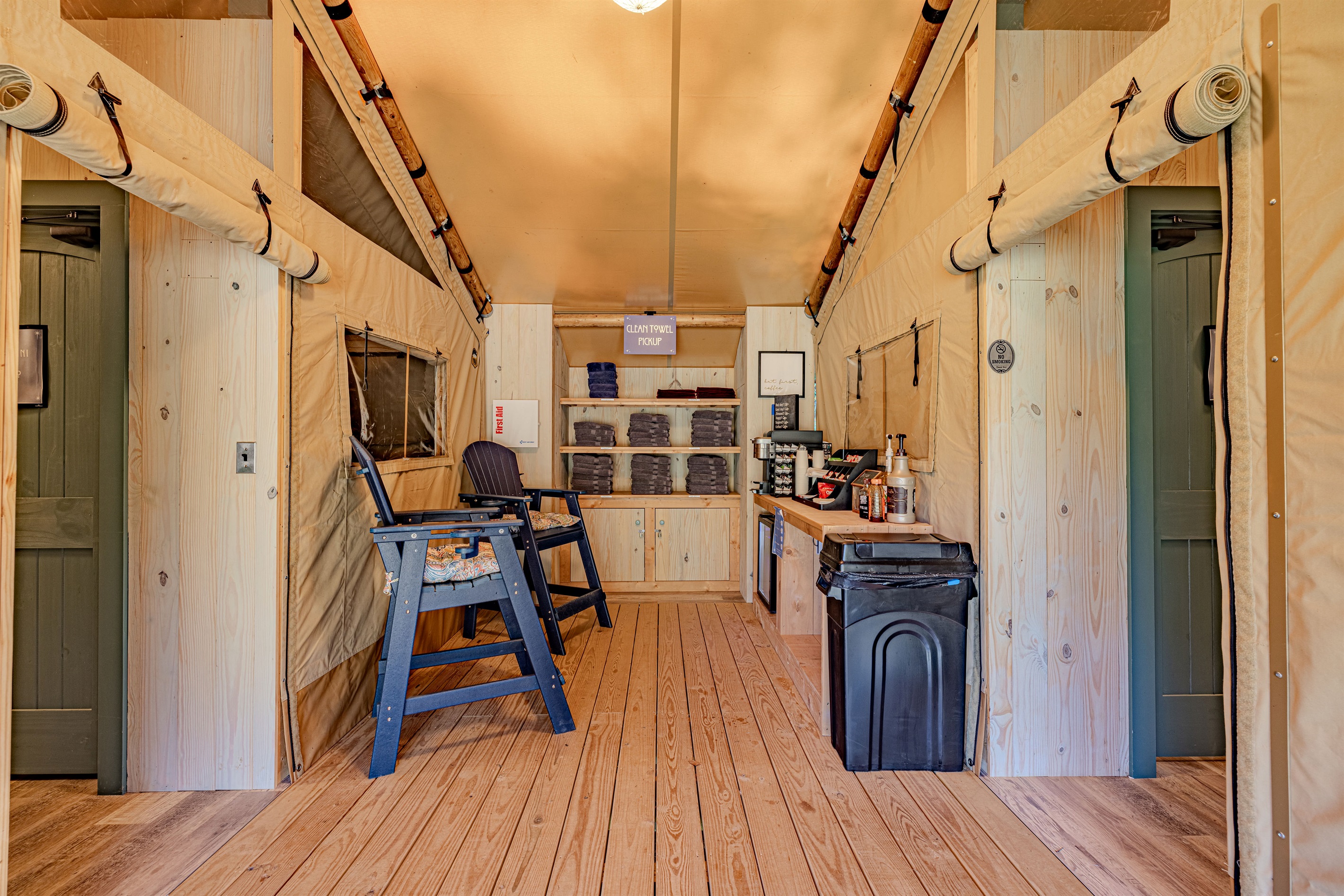 Welcome to the heart of the village. This comfortable common space features a coffee station and fresh towels, making it the perfect spot to start your morning or settle in for a chat.