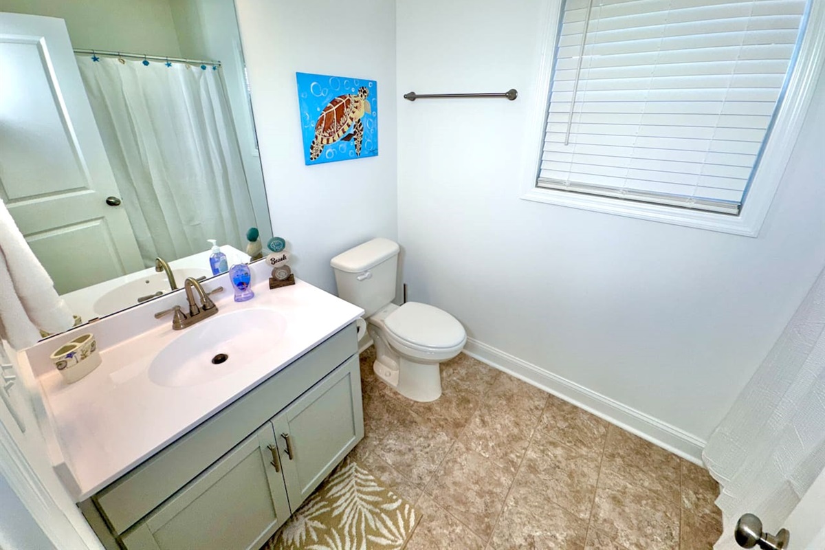Hall full bathroom has a shower/bathtub. 