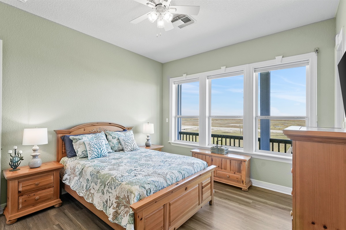 The queen-sized guest room is bright and airy with it's own en-suite bathroom.