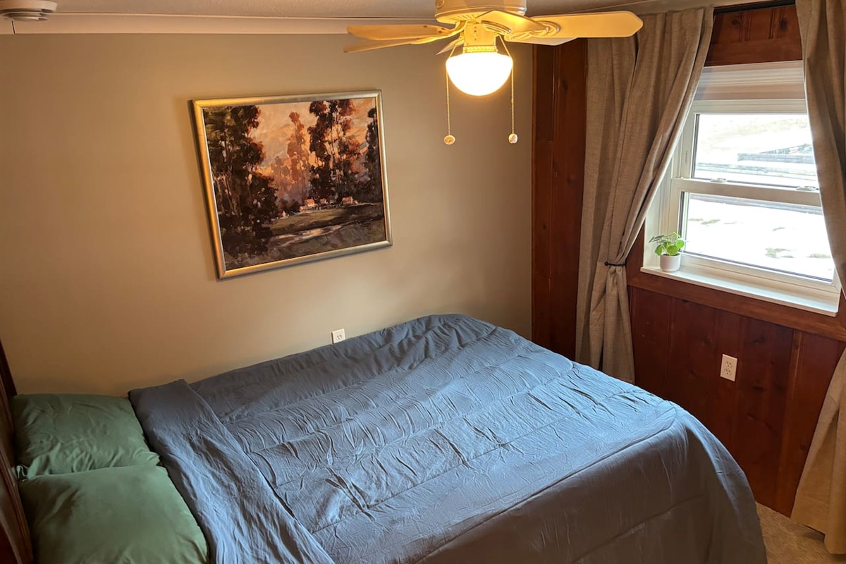 Very comfortable, queen size memory foam mattress, with silky-smooth sheets and comforter. Light filtering shade for privacy without lacking natural light. Insulated blackout curtains for extra comfort and darkness.