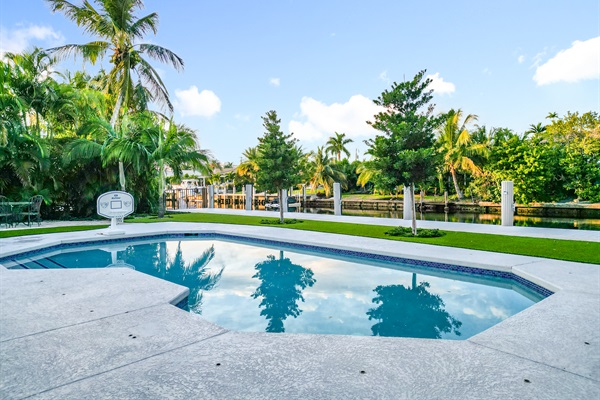 Looking out at night you will see a lit up Pier 66