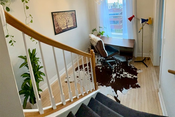 Staircase connecting the levels of the home.