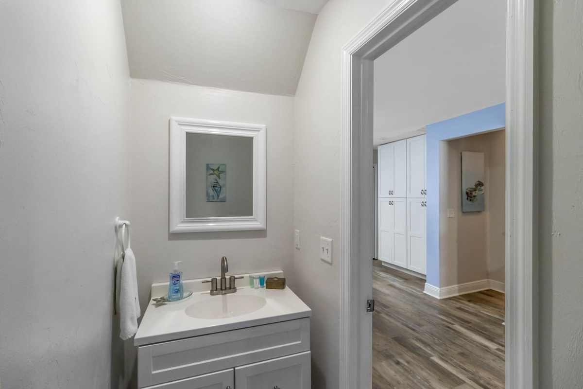  Use the half bath on the main level when you're back from the beach and can't wait &mdash; convenient, close, no stairs.