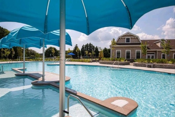 Welcome to our seasonal outdoor pool, available from June to mid-September! Take a dip, soak up the sun on lounge chairs, and enjoy the summertime bliss. It's your go-to spot for relaxation and staying cool during the warmer months