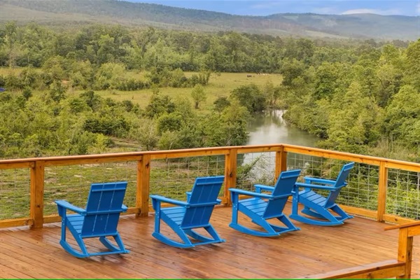 Panoramic deck views overlooking the river and rolling hills—perfect for morning coffee.
