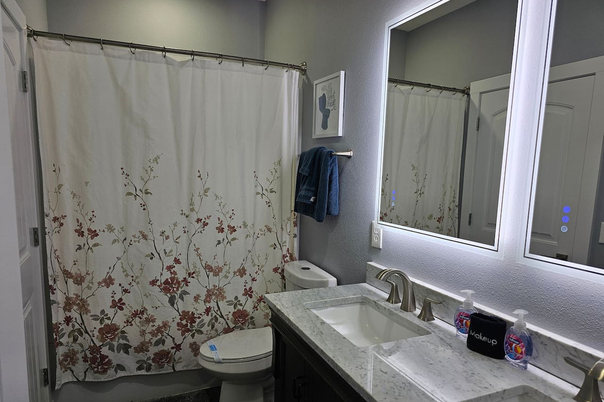 Comfortable full bathroom with shower/tub combo—perfect for groups and families.