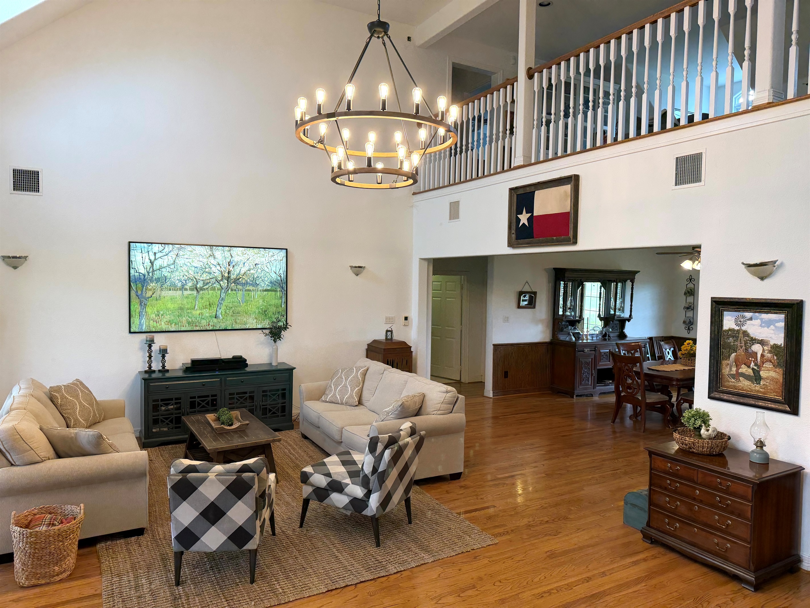 Large living room with 21 foot ceiling.