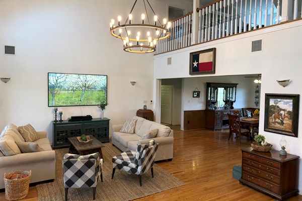 Large living room with 21 foot ceiling.