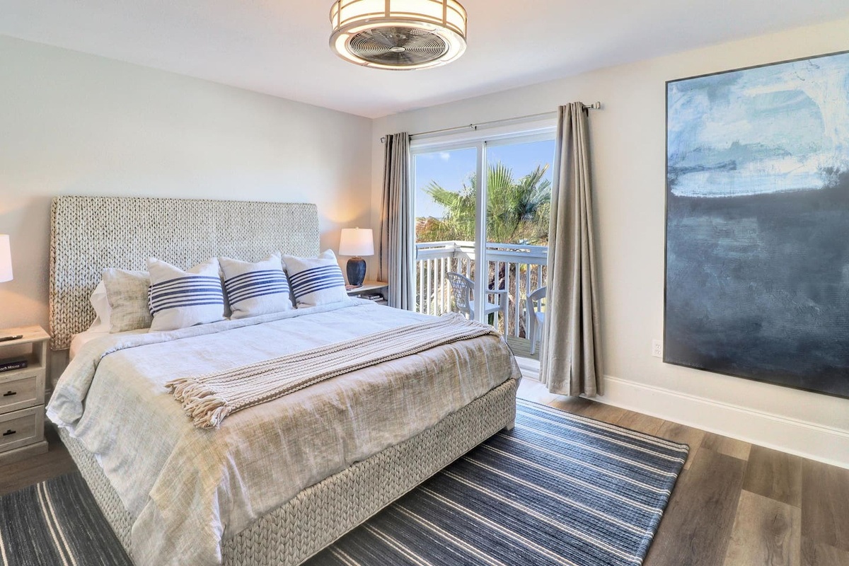 Your master suite is made for slow mornings &mdash; king bed, soft linens, and Gulf light at sunrise.	