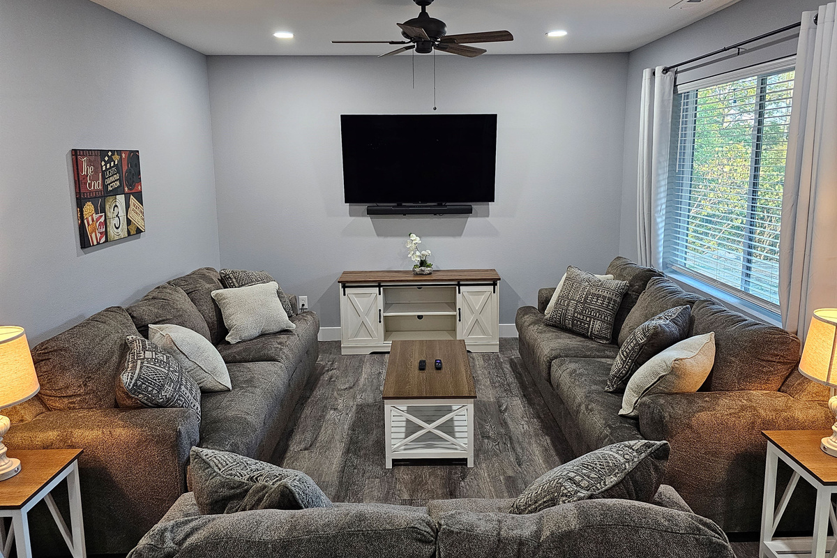 Downstairs second living area with surround sound to enjoy your moving watching.