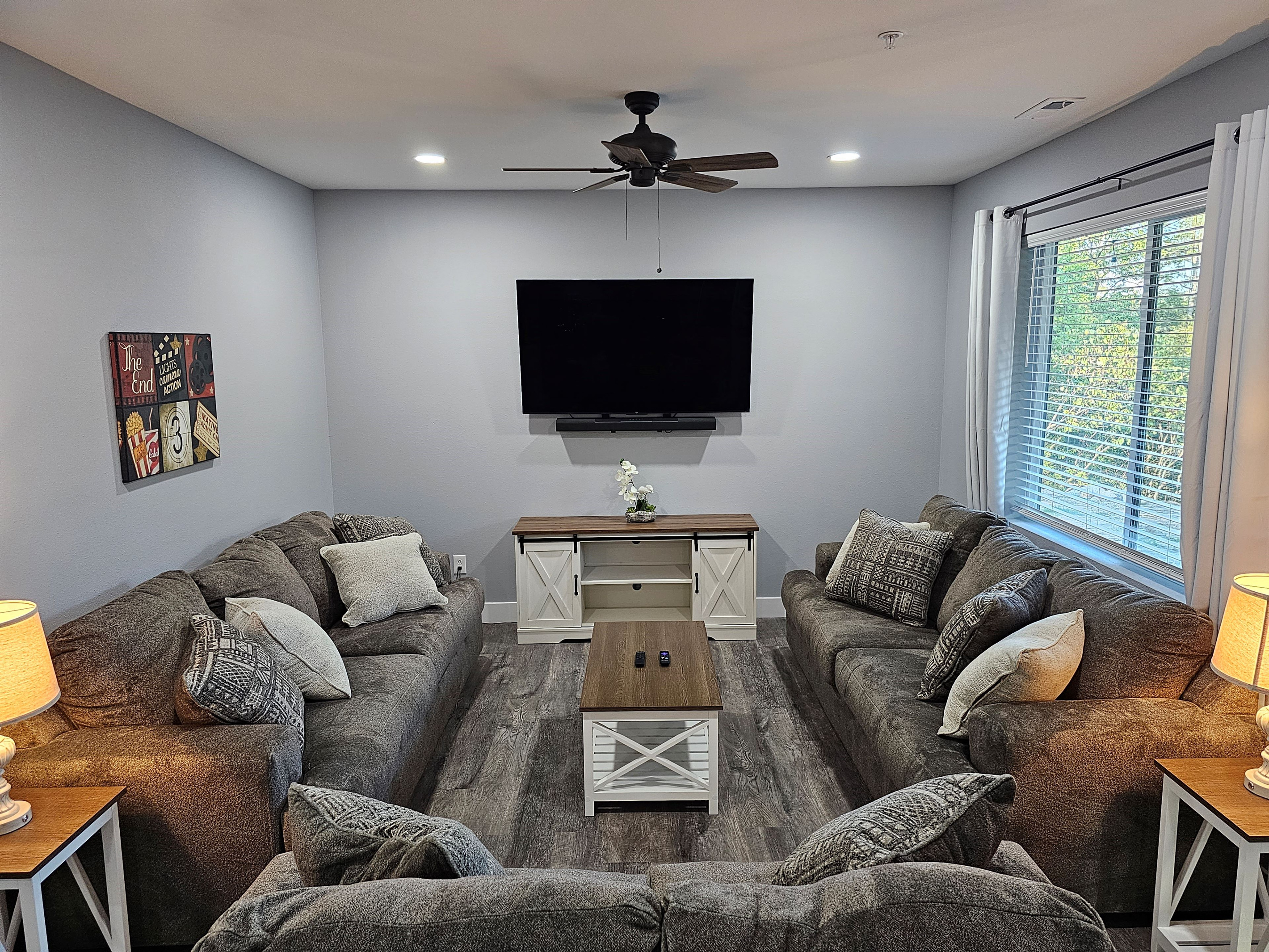 Downstairs second living area with surround sound to enjoy your moving watching.
