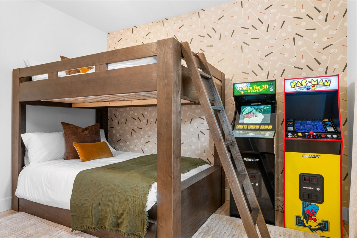 Fun bunk room with arcade games—perfect for kids and kids at heart.