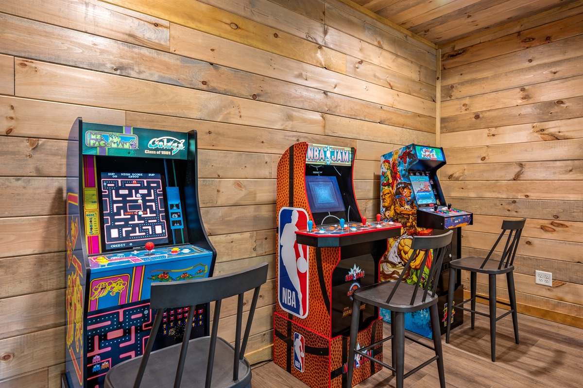Three 3/4 sized arcade games with classic games such as Ms Pac-Man, Galaga, Dig Dug, NBA Jam, and Street Fighter II Turbo. 