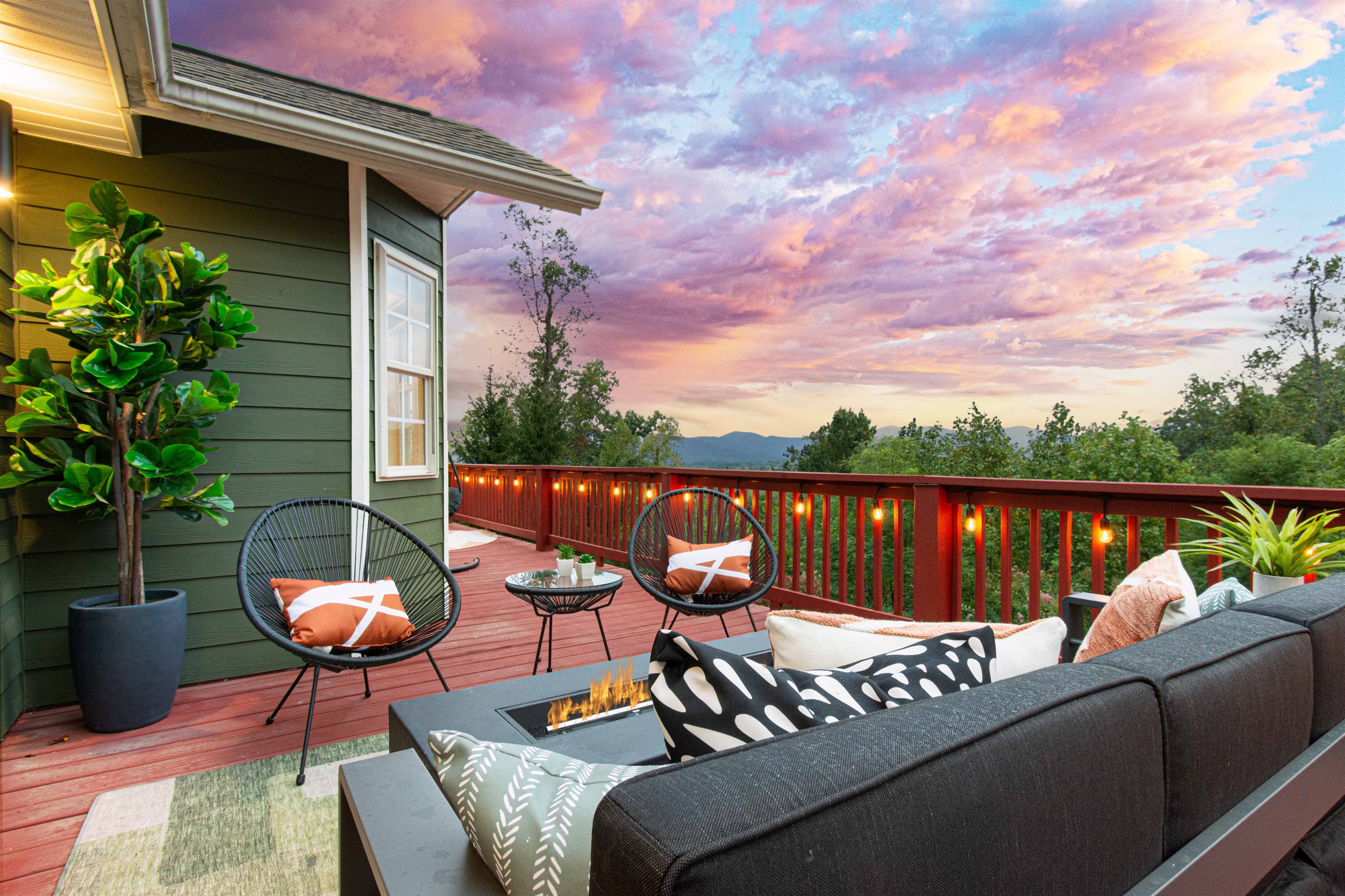 Relax on the spacious deck with cozy seating and breathtaking mountain views. Perfect for enjoying the sunset in comfort and style.
