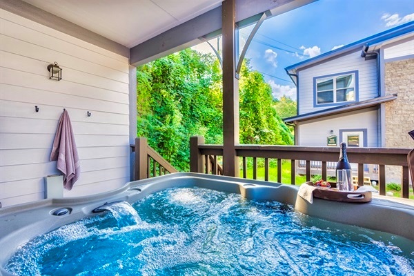Unwind in the private hot tub under a starlit sky for the ultimate relaxation experience.