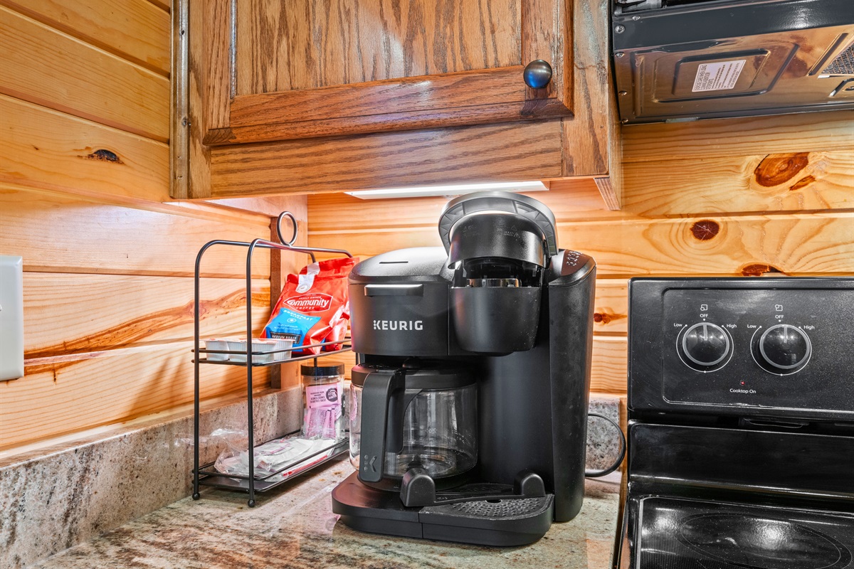 The dedicated coffee station is perfect for slow mornings, letting you enjoy your first cup while taking in the quiet cabin surroundings.