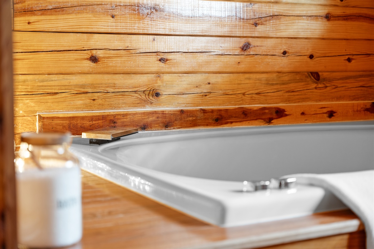 A steamy soak, bath salts, and cozy ambiance—yes, please