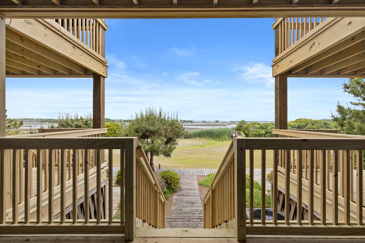 Direct boardwalk access leading to the water and dock