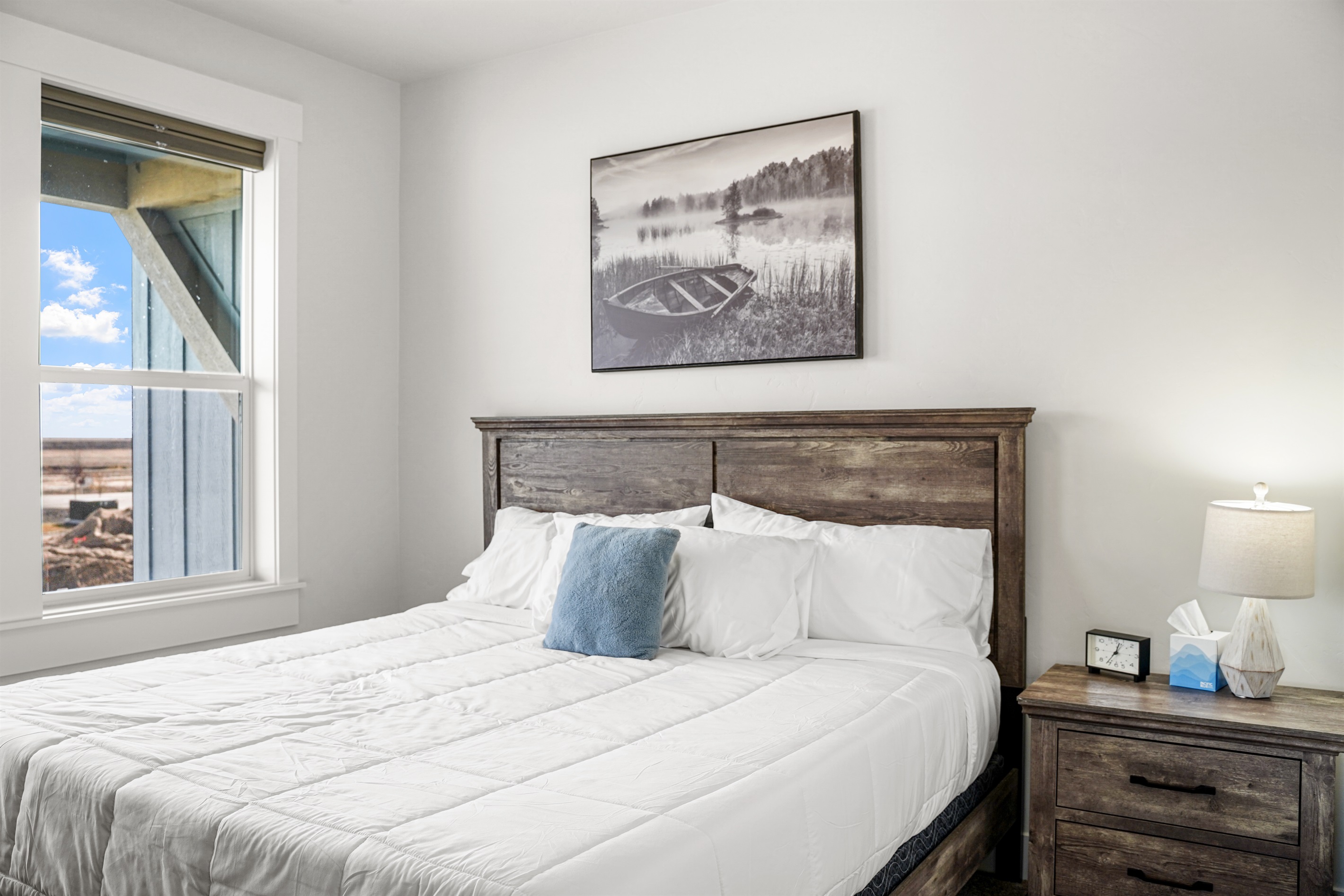 Wake up refreshed in this quiet bedroom with beautiful natural light.
