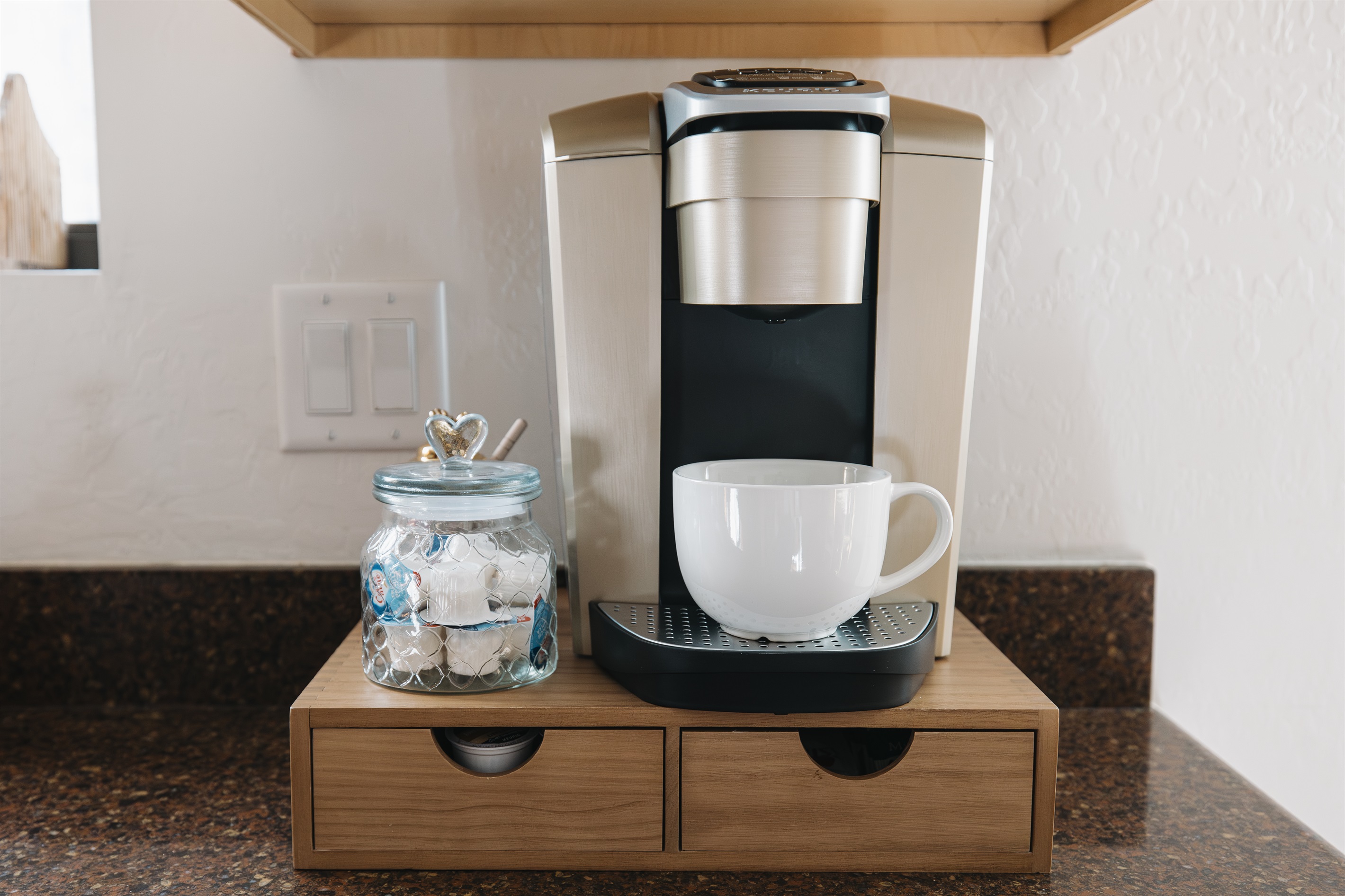 Morning coffee made easy with a Keurig coffee station—stocked with pods and mugs for cozy mountain mornings before skiing, hiking, or lake days in Pinetop.