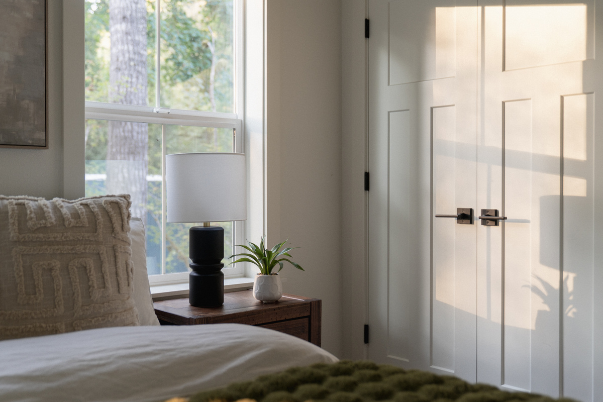 Soft light, forest views — your bedroom retreat awaits.