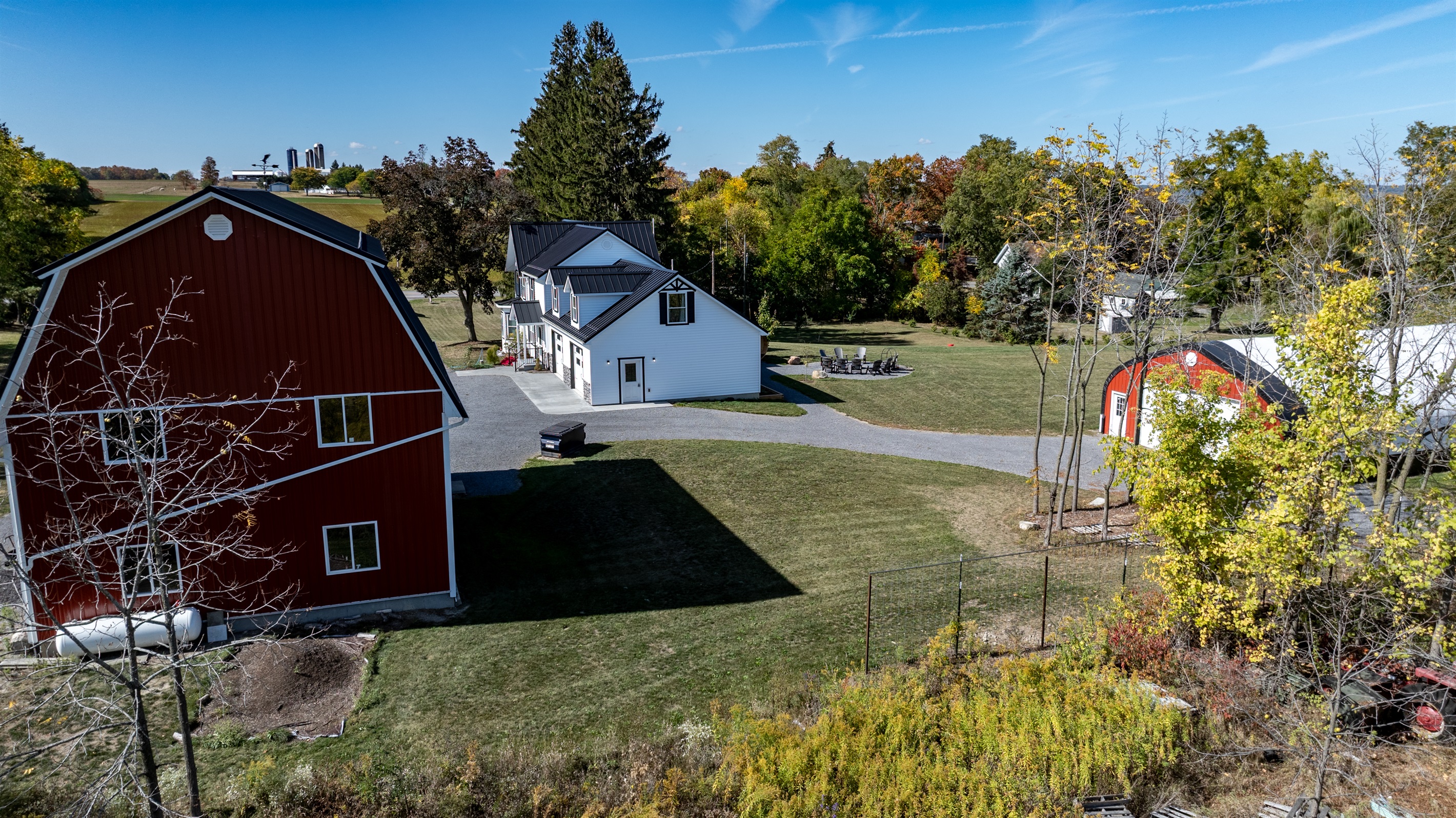 Farmhouse and barn side-by-side — country serenity just minutes from Finger Lakes adventures