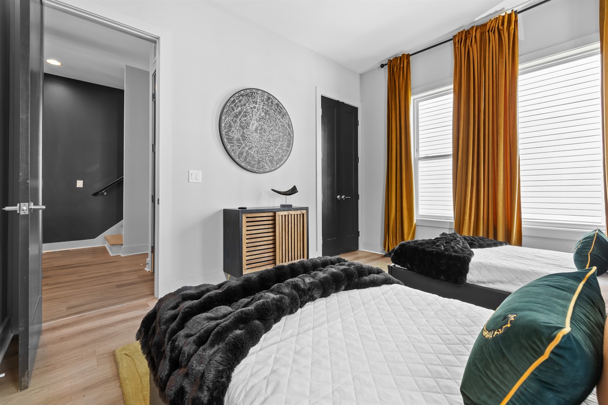 Bedroom: Chic decor meets bright natural light for a refreshing retreat in Nashville!