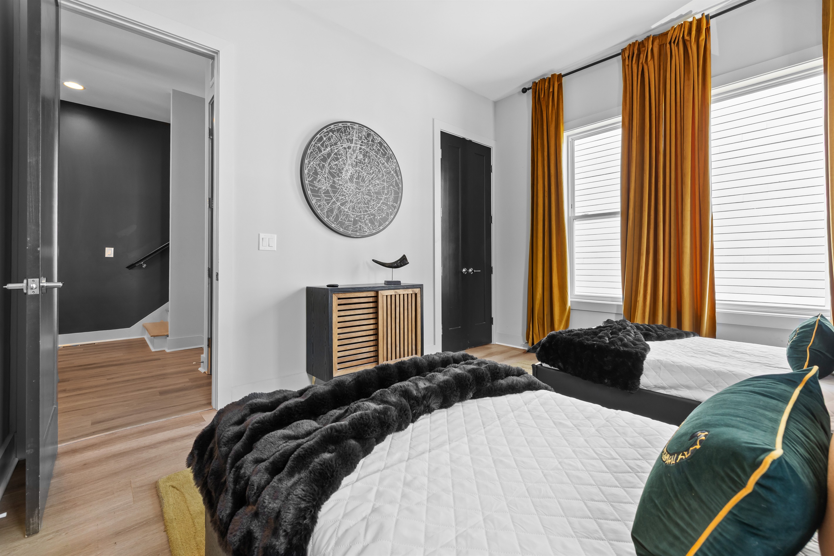 Bedroom: Chic decor meets bright natural light for a refreshing retreat in Nashville!