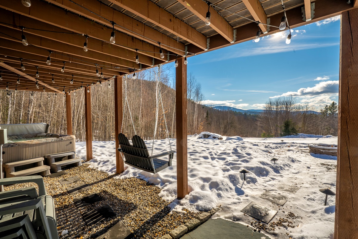 Daytime relaxation in the hot tub with panoramic mountain scenery