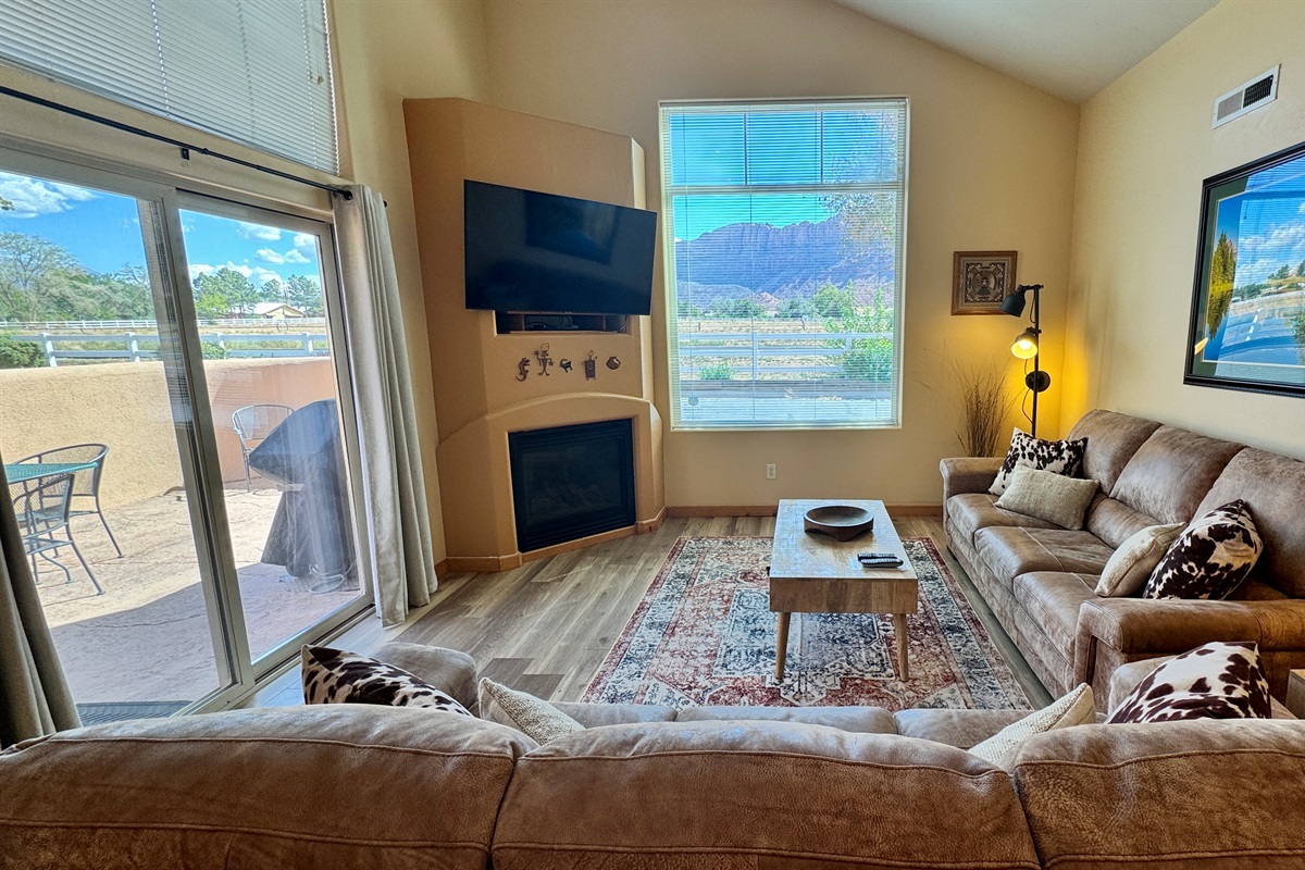Spacious living area with leather sofas and huge views!