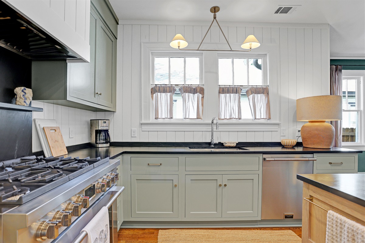 Featuring Fulgor Milano appliances, soapstone countertops, and custom Shiloh cabinetry for a premium cooking experience.
