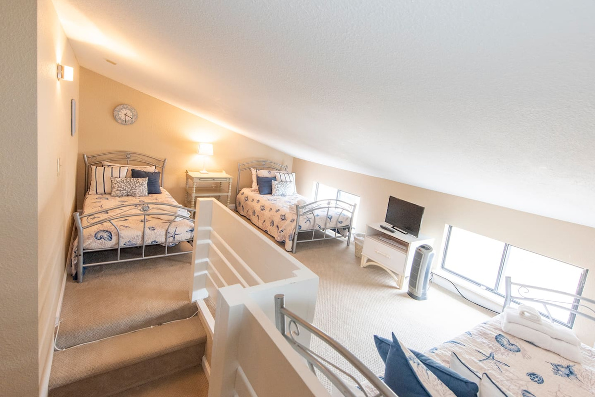 Pack the kids into the loft and they won't want to come down &mdash; three beds, a flat-screen TV, and their own space to take over.