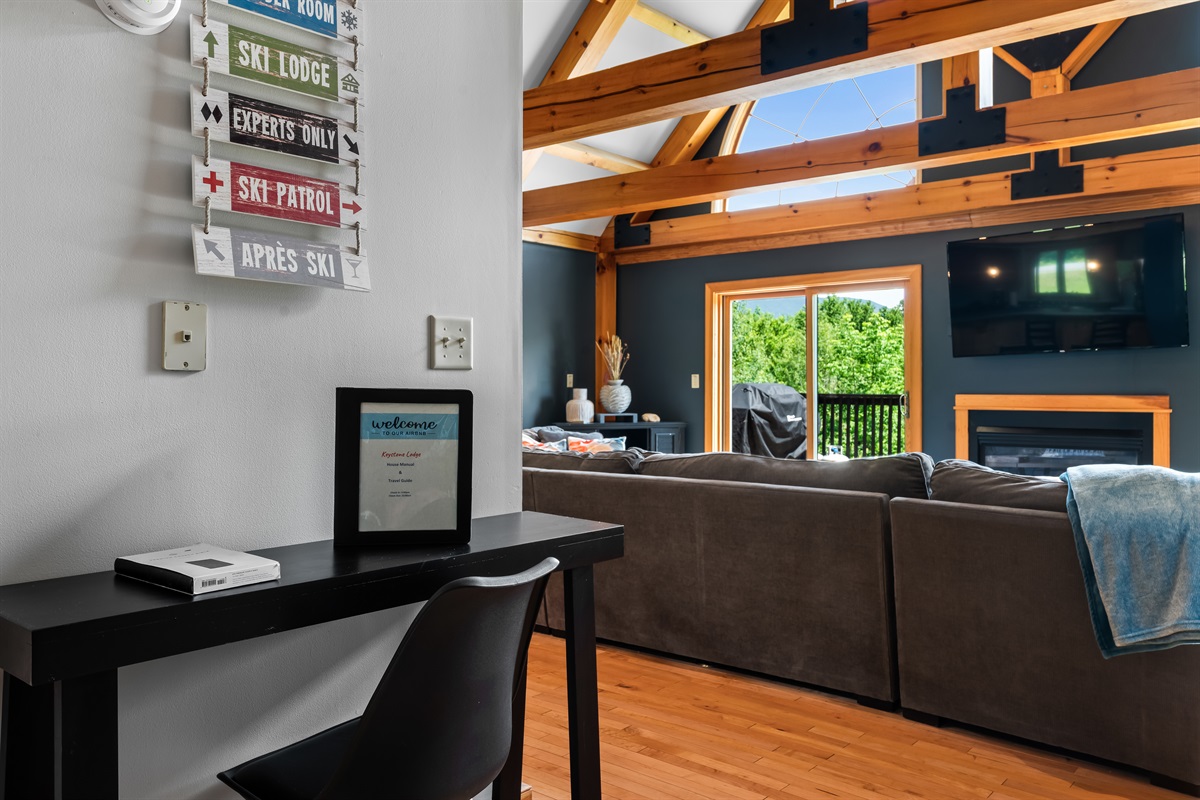 Whether planning the day or checking in remotely, this desk nook keeps life organized without missing the fun.