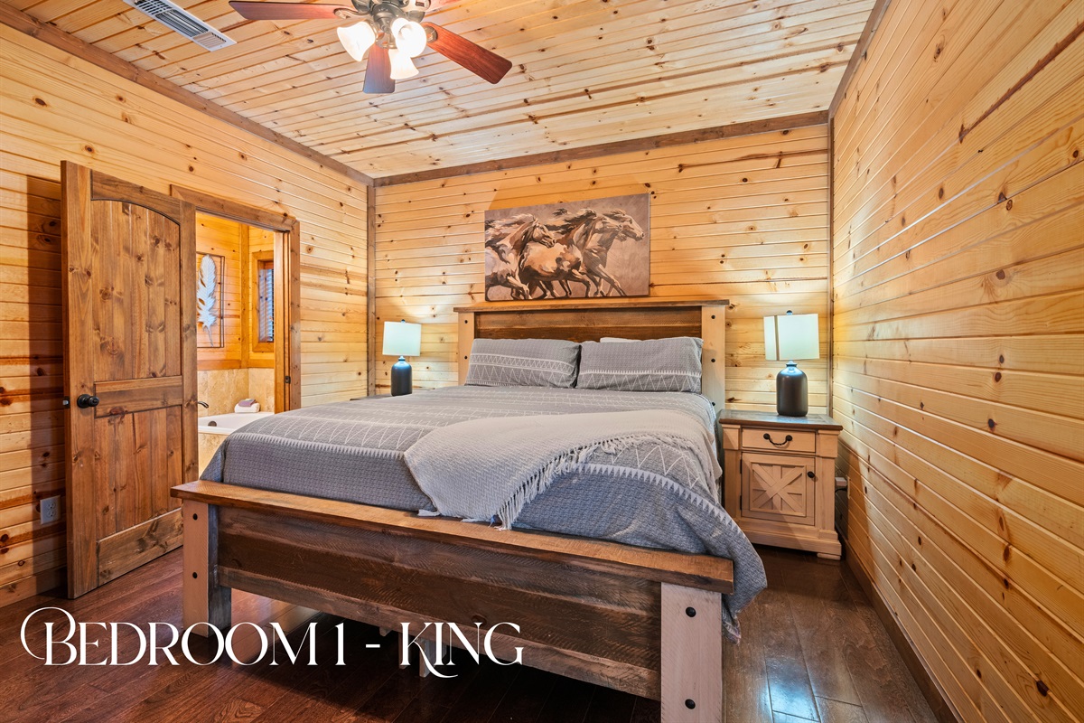 The primary king bedroom feels peaceful and relaxing, offering a comfortable retreat at the end of a full day of adventure.